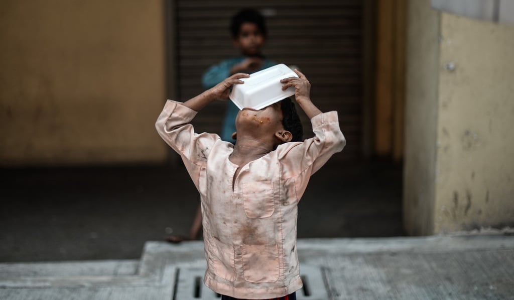 Twenty per cent of Malaysian children living in subsidised housing suffer from acute malnutrition. Photo: AFP Twenty per cent of Malaysian children living in subsidised housing suffer from acute malnutrition. Photo: AFP