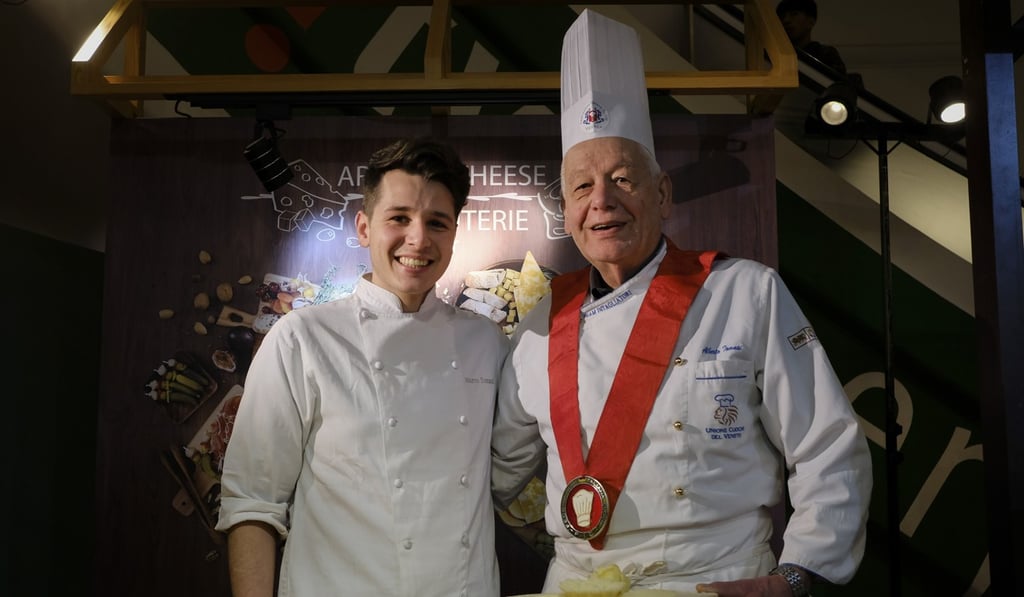 Alberto Tomasi and his grandson Marco at Times Square. Photo: James Wendlinger