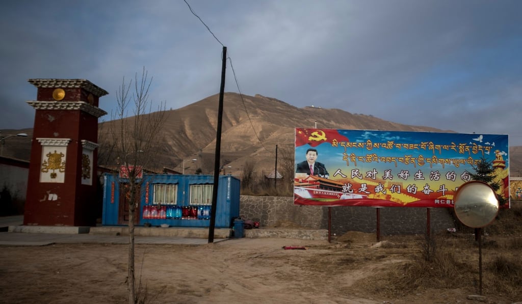 A propaganda poster showing China's President Xi Jinping next to a freeway outside of Tongren, Qinghai province. Photo: AFP A propaganda poster showing China's President Xi Jinping next to a freeway outside of Tongren, Qinghai province. Photo: AFP