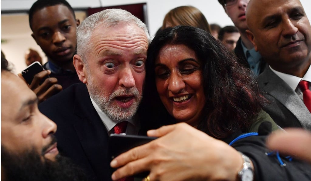 Bitish opposition Labour party leader Jeremy Corbyn poses for a selfie after giving a speech on Brexit at Coventry University in Coventry on Wednesday. Photo: AFP Bitish opposition Labour party leader Jeremy Corbyn poses for a selfie after giving a speech on Brexit at Coventry University in Coventry on Wednesday. Photo: AFP