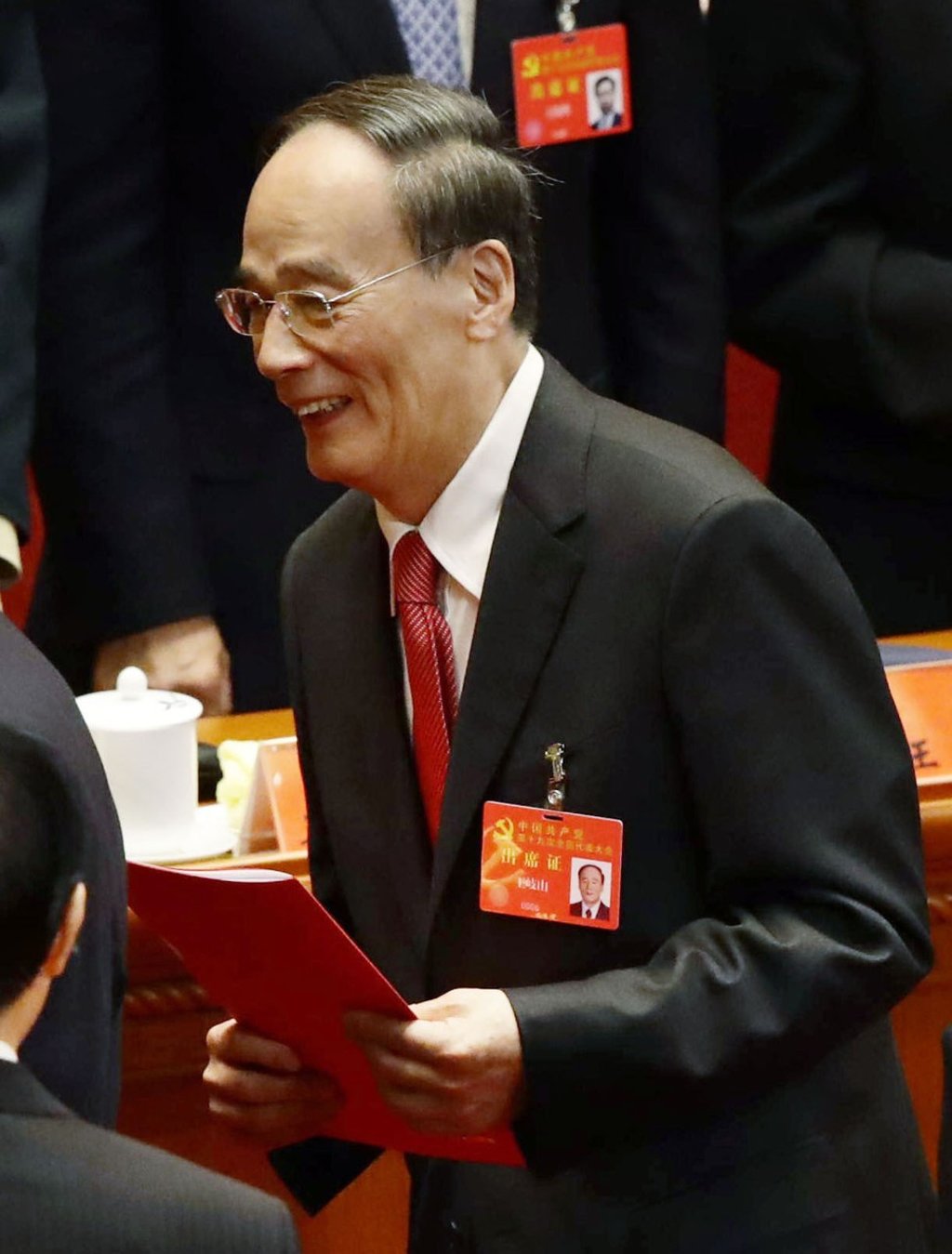 Former anti-graft tsar Wang Qishan has taken a seat on the presidium. Photo: Kyodo