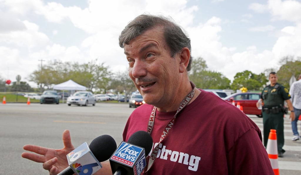 Mathematics teacher Jim Gard speaks with reporters at Marjory Stoneman Douglas High School in Parkland, Florida, on February 23. Photo: Reuters
