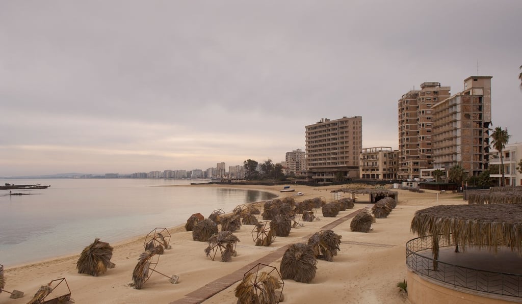 Weeds overrun a street in the battered frontier ghost town of Varosha on Cyprus. Picture: AFP