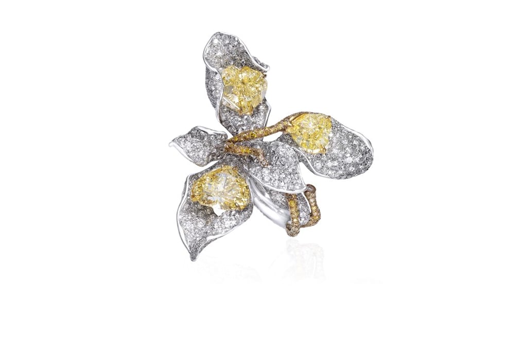 Cindy Chao. The Yellow Diamond Leaves Ring in white gold is decorated with three heart-shaped yellow diamonds, 526 diamonds and 191 yellow diamonds. Price on request