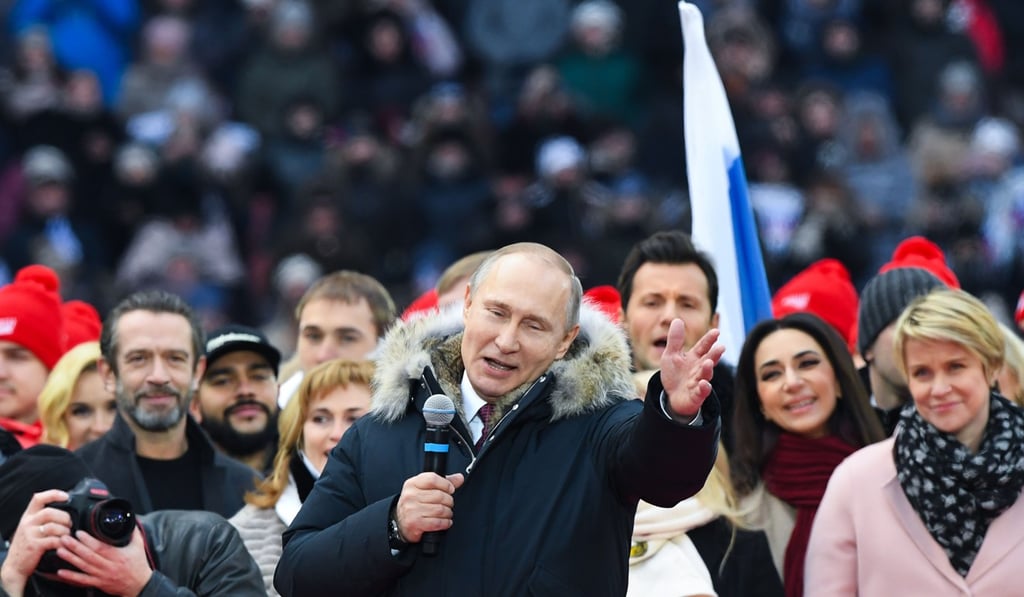 President Vladimir Putin gives a speech during a rally for the presidential election on March 3, 2018. Photo: AFP
