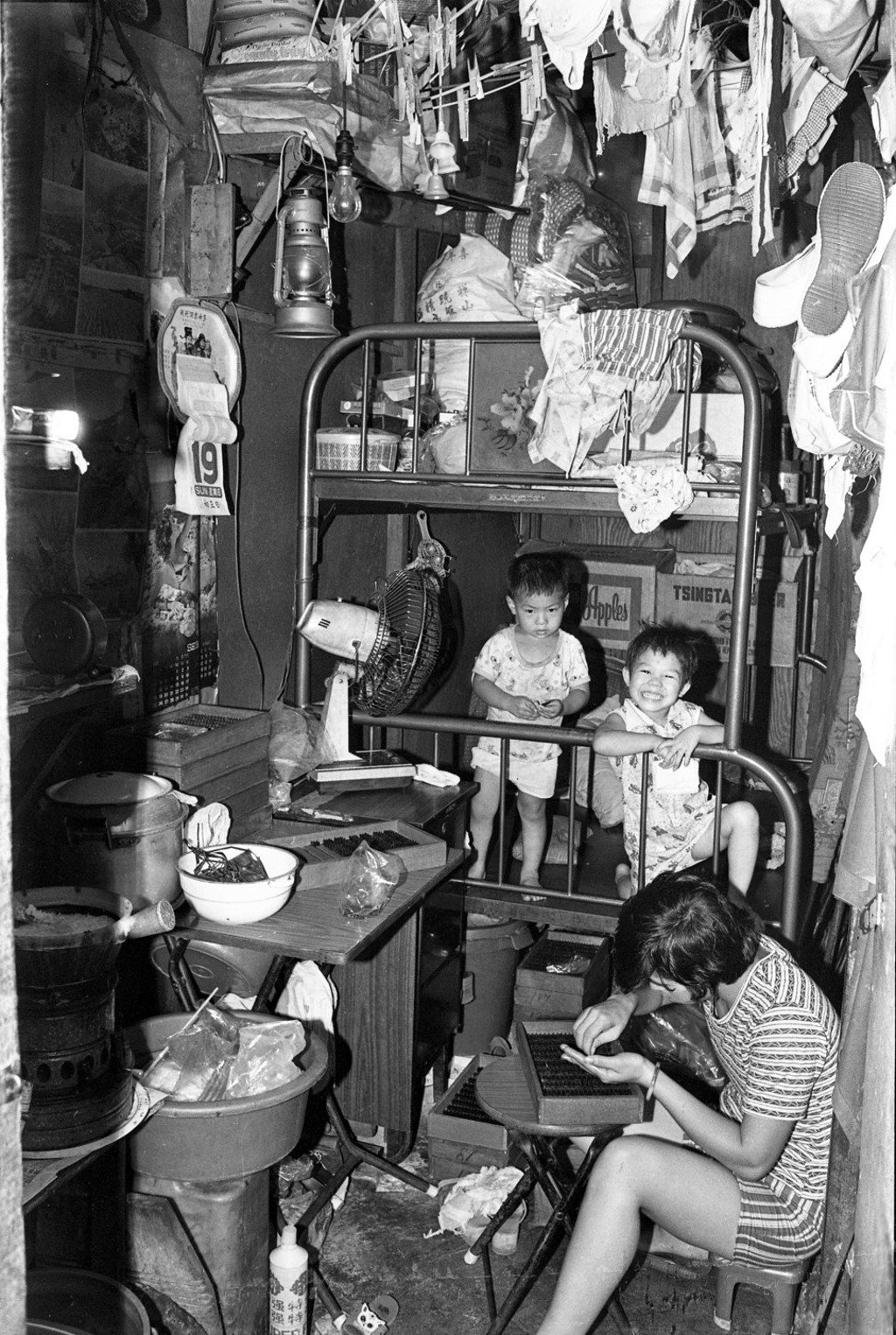 Although the living conditions in this hut in Kwai Shing Wai, Kwai Chung, New Territories, are far from ideal, its young residents do not seem to mind. Picture taken in 1977. Photo: Sunny Lee