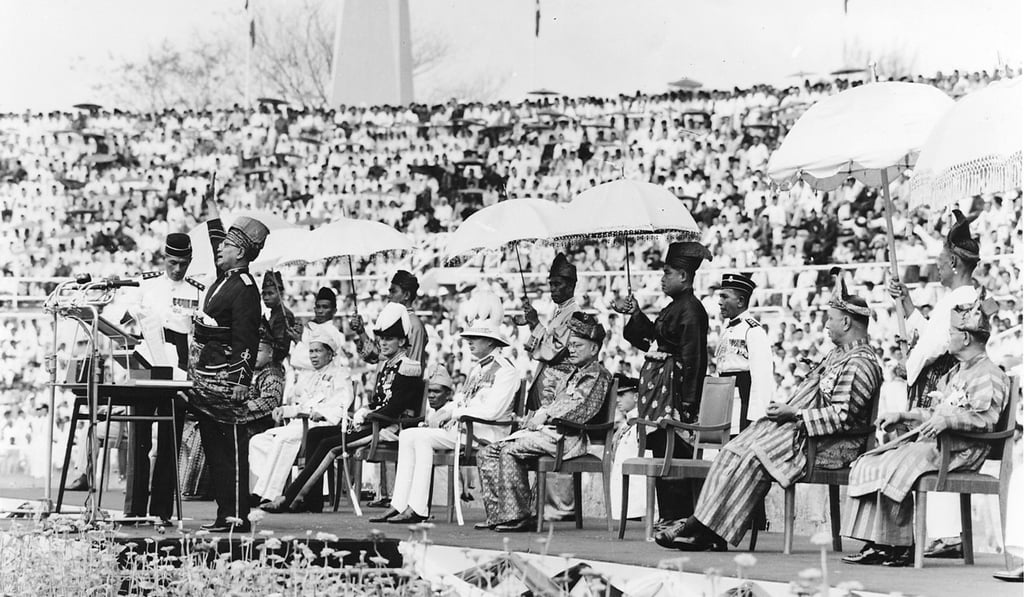 Malaysia's first prime minister, Tunku Abdul Rahman, declares his country's independence from British rule in August 1957. British residents there at independence were given leave to stay permanently. Picture: AFP Malaysia's first prime minister, Tunku Abdul Rahman, declares his country's independence from British rule in August 1957. British residents there at independence were given leave to stay permanently. Picture: AFP