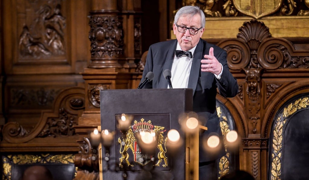 European Commission chief Jean-Claude Juncker speaking at a dinner on March 2 at Hamburg City Hall in Germany. He said the EU is drawing up retaliatory measures against leading US brands such as Levi's and Harley-Davidson after US President Donald Trump threatened a trade war, with plans for tariffs on steel and aluminium. Photo: AFP