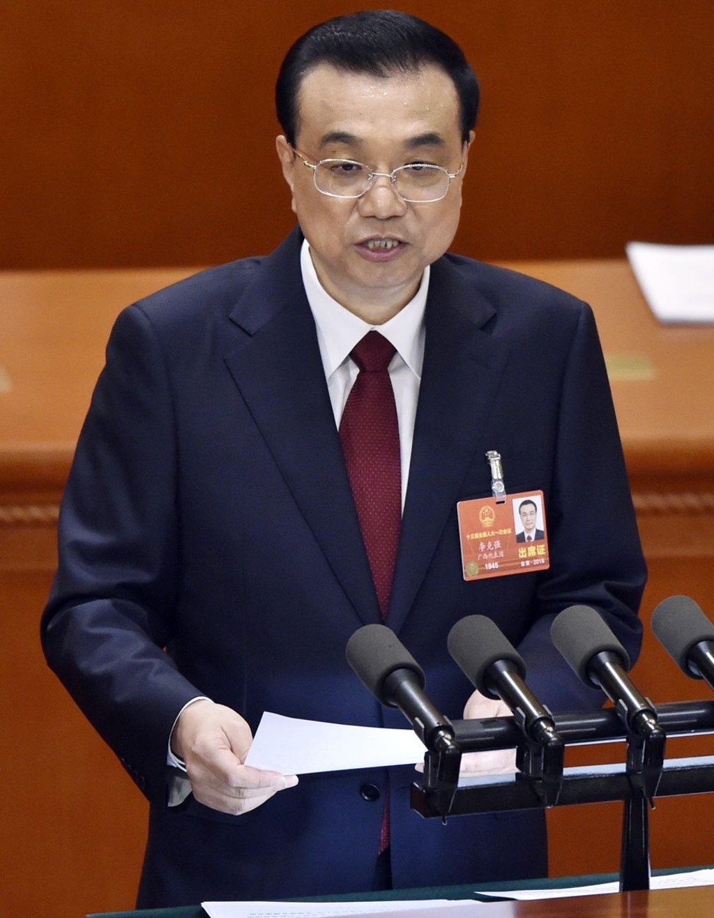 Premier Li Keqiang delivers a speech at the Great Hall of the People in Beijing on the first day of the annual session of the National People's Congress. Photo: Kyodo Premier Li Keqiang delivers a speech at the Great Hall of the People in Beijing on the first day of the annual session of the National People's Congress. Photo: Kyodo