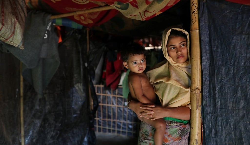 Rehana Khatun with her child at Kutupalong camp in Cox's Bazar, Bangladesh on January 19, 2018. Photo: Reuters