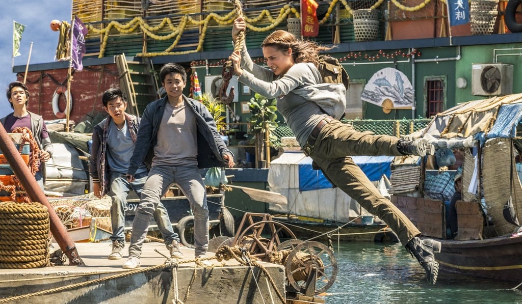 Alicia Vikander in action in a scene from Tomb Raider.