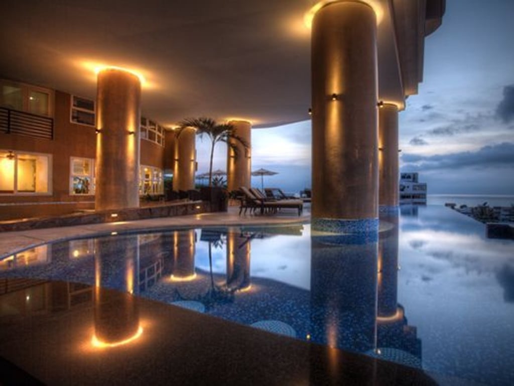 Beautiful corner suite penthouse in Puerto Vallarta, Mexico with unparalleled 360-degree views of remarkable ocean sunsets.