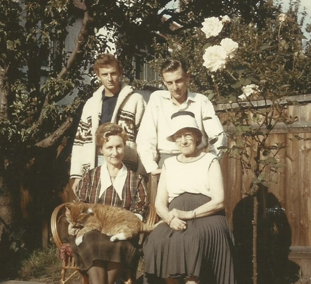 Brian Finch (right) with his mother, grandmother and elder brother, Bernard. Picture: courtesy of Brian Finch