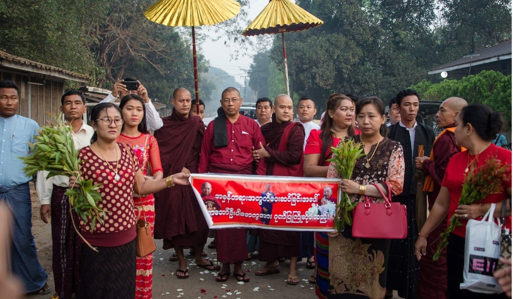 Pamaukkha walking with his supporters after being released from prison. Photo: AFP