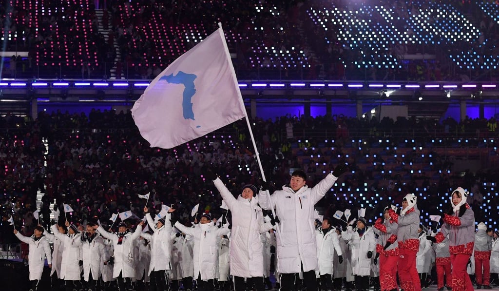 Members of the North and South Korean teams march under the unified Korean flag at the opening ceremony of the Pyeongchang Winter Olympic Games on February 9. Photo: AFP