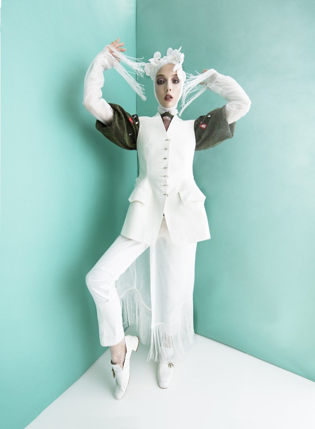 Gucci, green sweater, HK$52,500; Louis Vuitton, gilet, HK$42,500, trousers, HK$12,300; Thom Browne, fringed shirtdress, necklace applique and organza, price on request; Falke, hosiery, price on request; Stuart Weitzman, shoes, HK$5,300