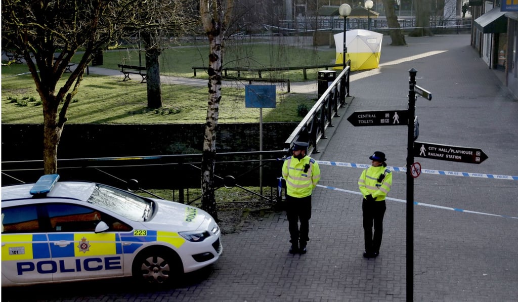 Police officers guard a cordon around a police tent covering the spot where former Russian double agent Sergei Skripal and his daughter were found critically ill following exposure to an ‘unknown substance’ in Salisbury, England. Photo: AP