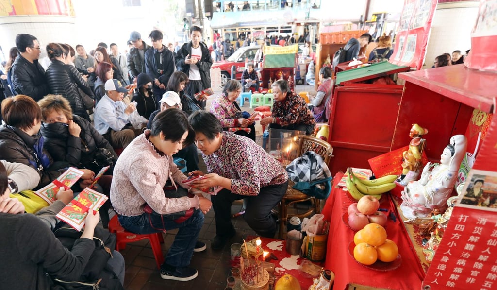 The area under the Canal Road West Flyover in Causeway Bay is known for stalls offering the spell ritual. Photo: Felix Wong