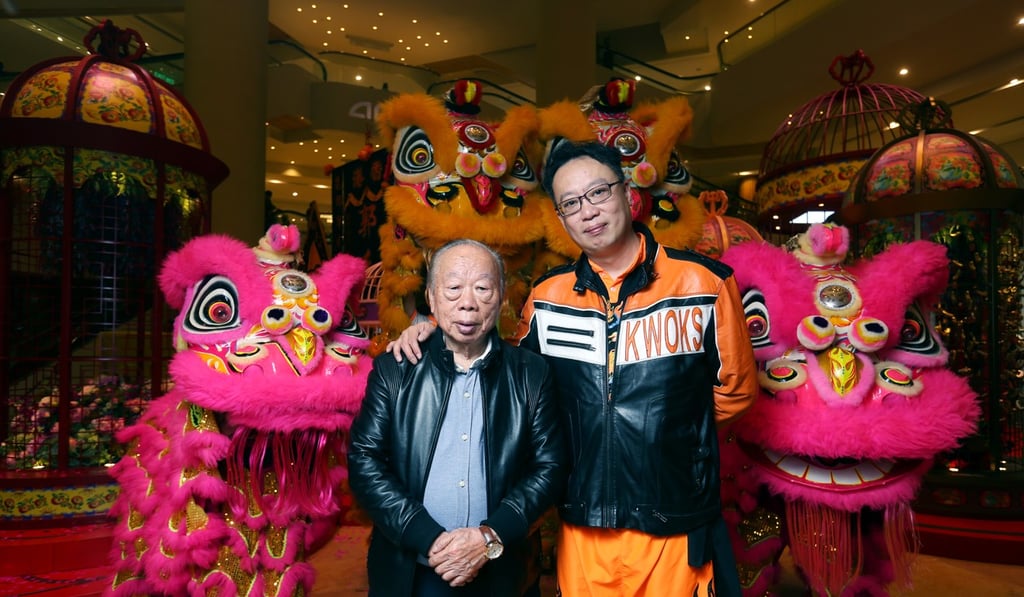 Kwok Wing-cheong, founder of Kwok's Lion Dance Team, and son Andy Kwok, the team’s head coach, after a performance at Pacific Place in Admiralty. Photo: Xiaomei Chen