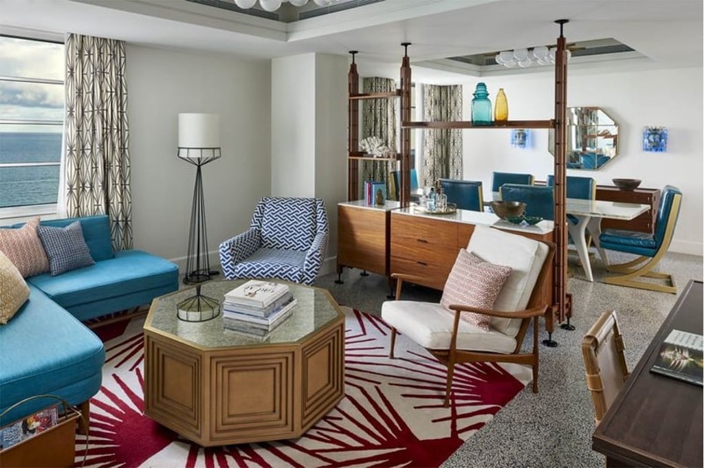 A penthouse suite living room at La Confidante in Miami Beach. For guests in the Penthouse and Miranda suites, unlimited glasses from the Plum will be free during stays until April 30. Photo: La Confidante A penthouse suite living room at La Confidante in Miami Beach. For guests in the Penthouse and Miranda suites, unlimited glasses from the Plum will be free during stays until April 30. Photo: La Confidante