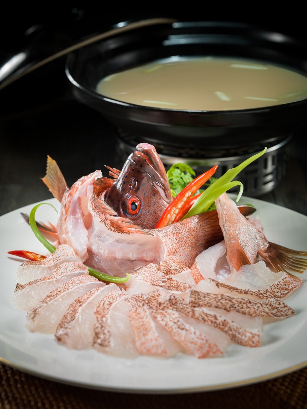 Boiled spotted grouper with white turnip served at Canton, a restaurant at The Venetian Macao Boiled spotted grouper with white turnip served at Canton, a restaurant at The Venetian Macao