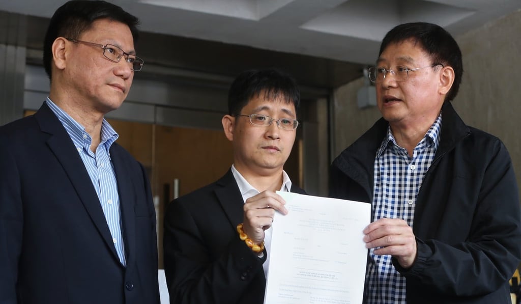 (From left) Lawyer Wong Kit-hin, applicant Wong Tai-hoi and ex-lawmaker Wong Kwok-hing file a judicial review against Au Nok-hin’s candidacy in the Legco by-election. Photo: Winson Wong