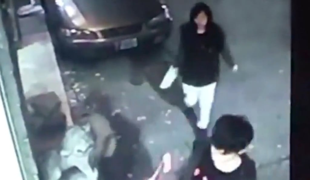 Hotel security footage showing the victim (back) and suspect (front) entering the building. Photo: Handout Hotel security footage showing the victim (back) and suspect (front) entering the building. Photo: Handout