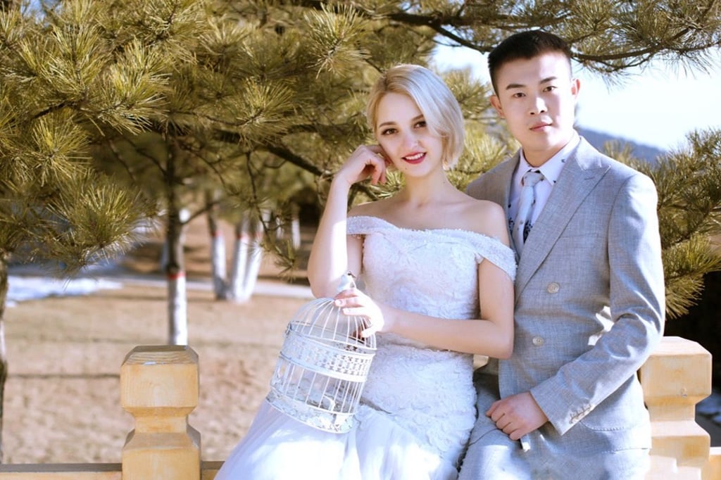 He Pengwei, from Shanxi province, and Inesa, from Ukraine, decided to get married after meeting in Beijing and falling in love. Photo: 163.com