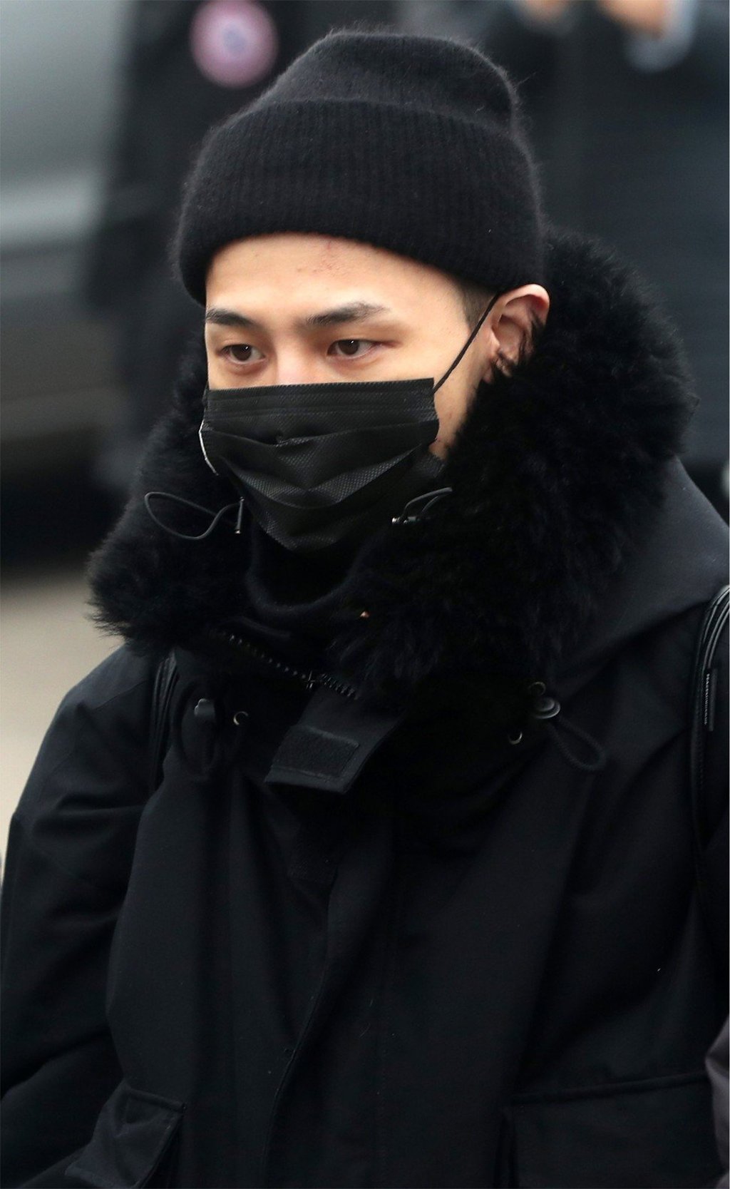 G-Dragon, a member of South Korean boy band Big Bang, enters a boot camp to start his military service in Cheorwon, in South Korea on February 27. Photo: EPA G-Dragon, a member of South Korean boy band Big Bang, enters a boot camp to start his military service in Cheorwon, in South Korea on February 27. Photo: EPA