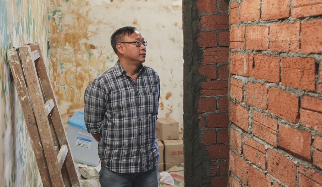Poon Kwok-hin at the flat under renovation in Cheung Sha Wan. Photo: Roy Issa