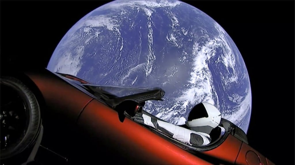 This image from video provided by SpaceX shows the company’s spacesuit in Elon Musk’s red Tesla sports car which was launched into space during the first test flight of the Falcon Heavy rocket in February, 2018. Photo: SpaceX/AP