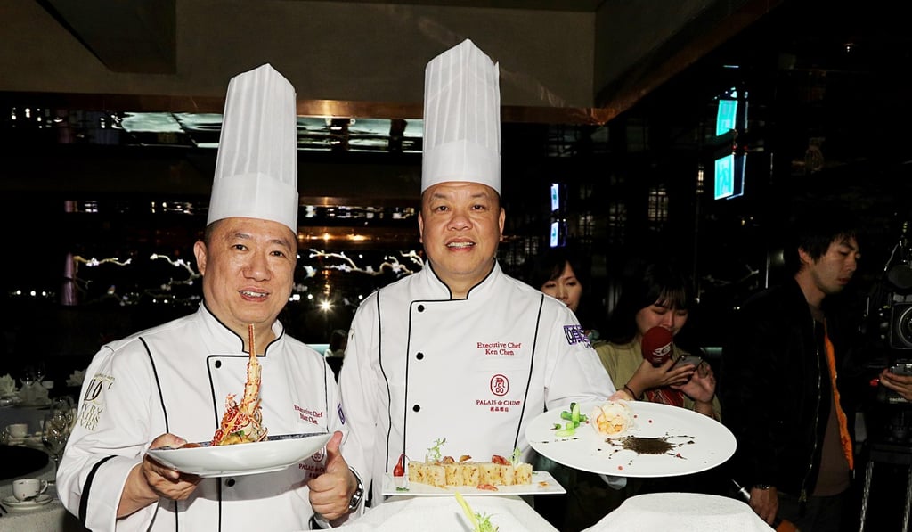 Cantonese restaurant Le Palais, under head chef Ken Chan (right) is the only one to receive three stars. Photo: CNA