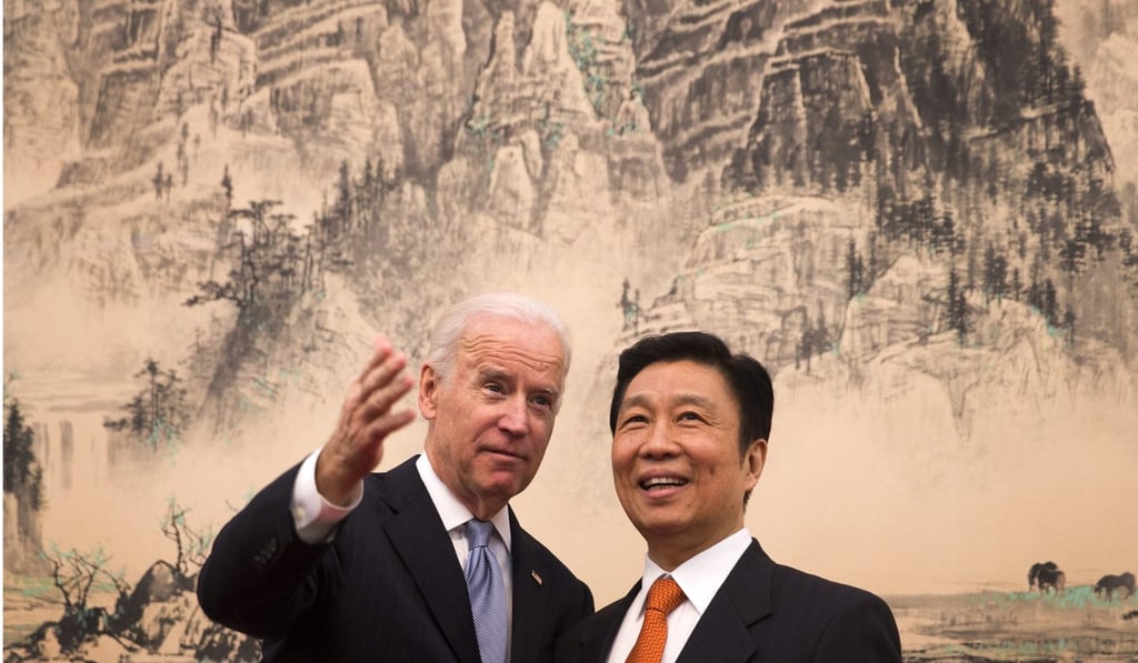 Former US vice-president Joe Biden talks with Li Yuanchao during a visit to Beijing in 2013. Photo: EPA