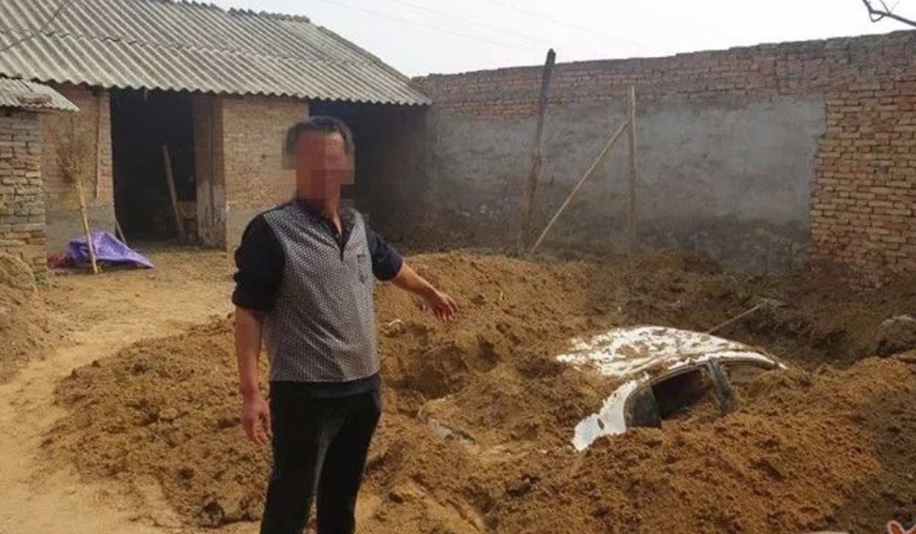 A motorist buried his car in his backyard after hitting three people with the vehicle. Photo: Handout