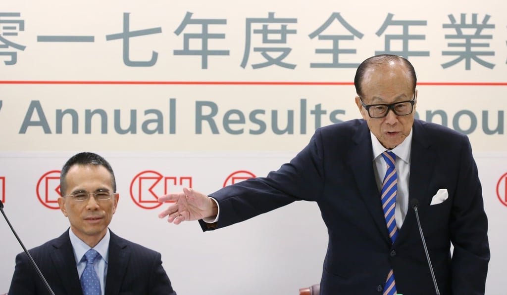 Victor Li (left) and Li Ka-shing attend CK Hutchison Holdings and CK Asset Holdings 2017 annual results announcement in Hong Kong on Friday. Photo: Sam Tsang