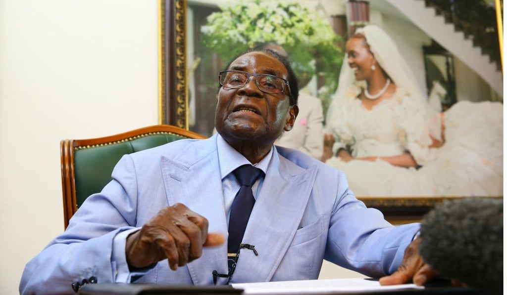 Former Zimbabwean President Robert Mugabe speaks to the media at his residence in Harare on March 15. Photo: EPA