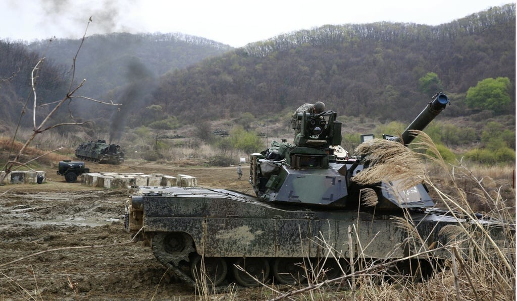 US Army soldiers with M1A2 tanks during drills in South Korea in April 2017. Photo: EPA