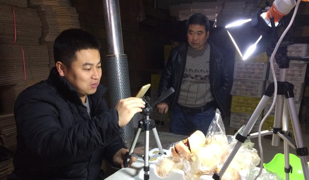 Handsome gets to work with his pomegranates. Photo: Coco Liu