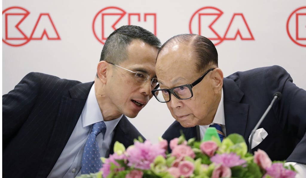 Hong Kong tycoon Li Ka-shing (right) is handing control of CK Hutchison Holdings, to his eldest son Victor Li (left). Photo: AP Photo