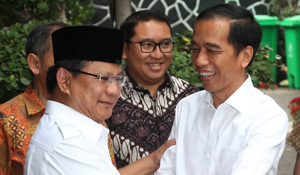 Prabowo Subianto, left, and Joko Widodo, meet in Jakarta after the 2014 election. Photo: AP