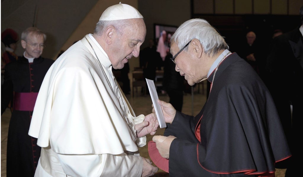 Retired bishop of Hong Kong, Cardinal Joseph Zen, hands a letter to Pope Francis at the end of his weekly general audience at the Vatican in January. Zen, who has long had contentious relations with the mainland government, has cast doubts on Beijing-Vatican ties and suggested that the pope needs someone to “calm ... down his enthusiasm” over negotiations. Photo: L'Osservatore Romano / pool photo via AP