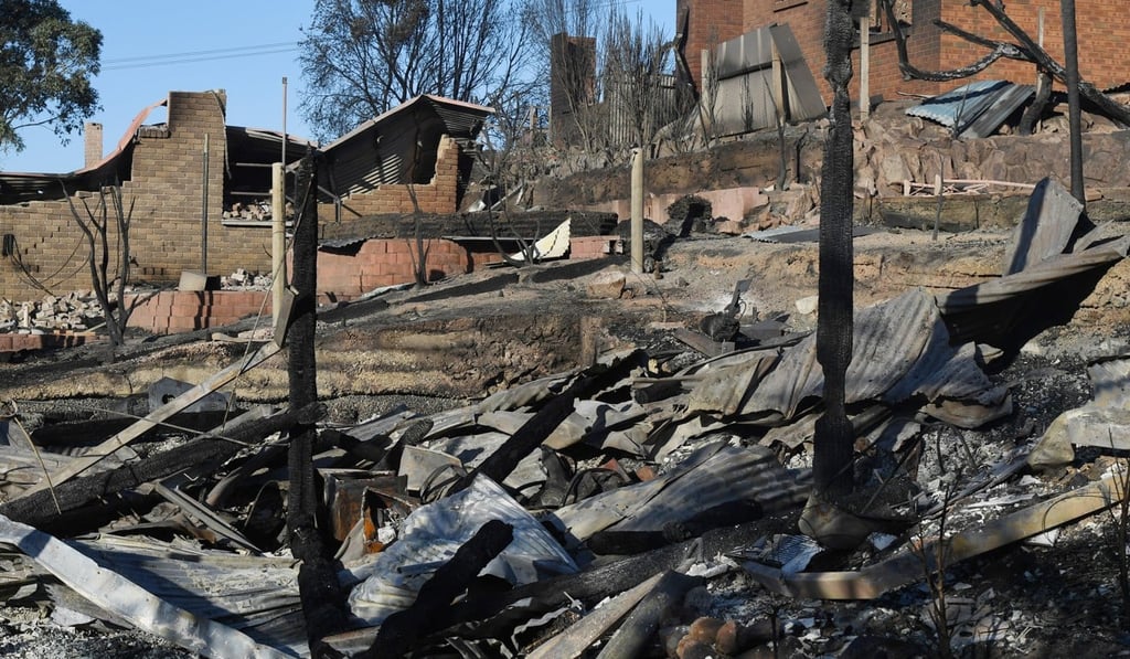 Houses and businesses destroyed by the bush fire in the coastal town of Tathra, New South Wales. Photo: EPA Houses and businesses destroyed by the bush fire in the coastal town of Tathra, New South Wales. Photo: EPA