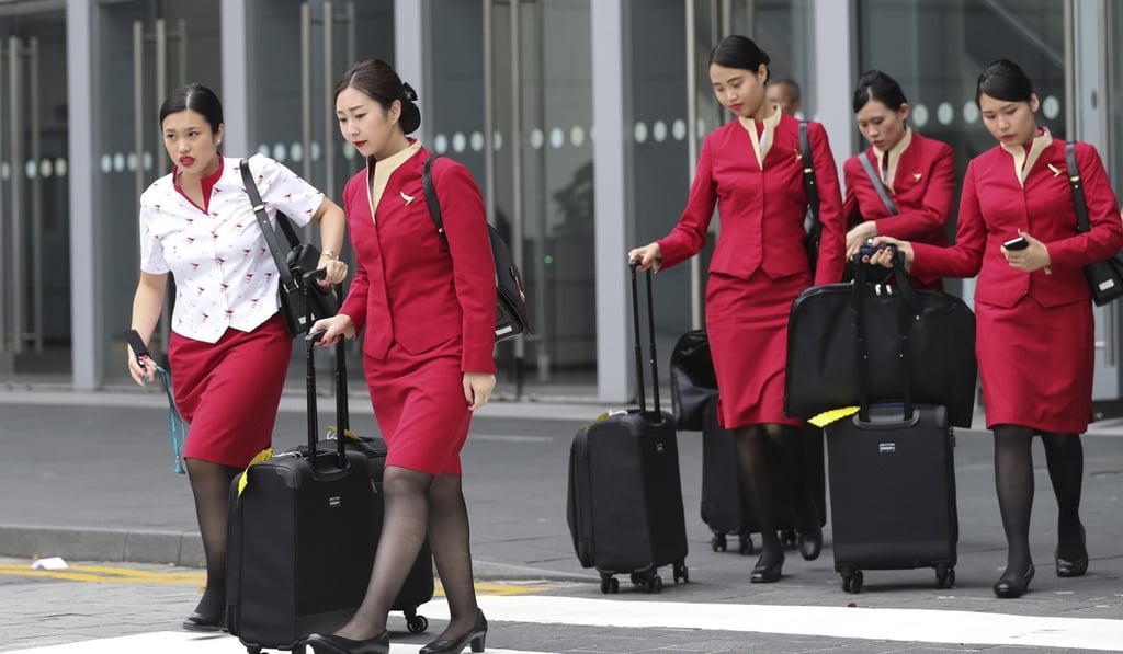 Cabin crew at Cathay Dragon asked their employer to ease their dress code. Photo: Edward Wong