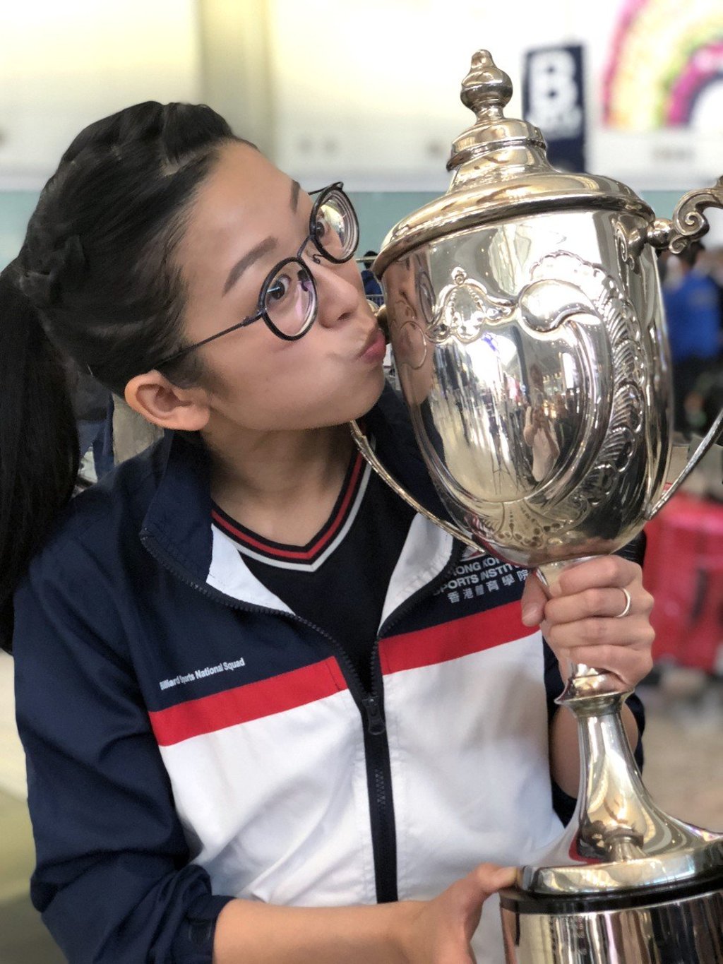 Ng On-yee kisses her World Championship trophy upon her return to Hong Kong from Malta. Photo: Chan Kin-wa