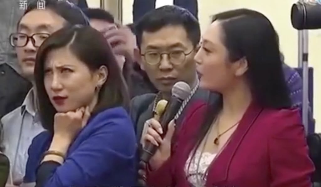 The exasperated expression of Yicai reporter Liang Xiangyi (left) at Zhang Huijun’s question at the National People's Congress sparked a social media frenzy. Photo: CCTV