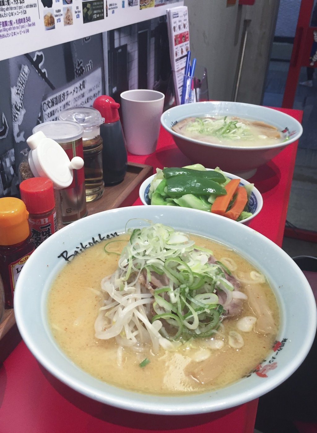 Miso ramen (foreground), vegetable selection, and shio ramen at Baikohken Ramen. Photo: Laurie Chen Miso ramen (foreground), vegetable selection, and shio ramen at Baikohken Ramen. Photo: Laurie Chen