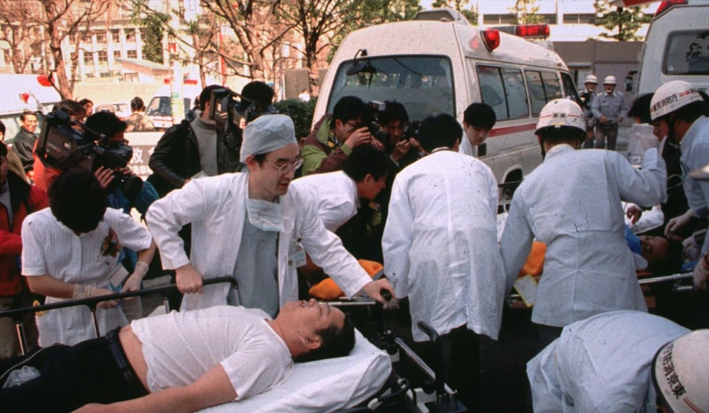 Passengers affected by sarin nerve gas in the central Tokyo subway trains are taken to hospital. File photo: AP