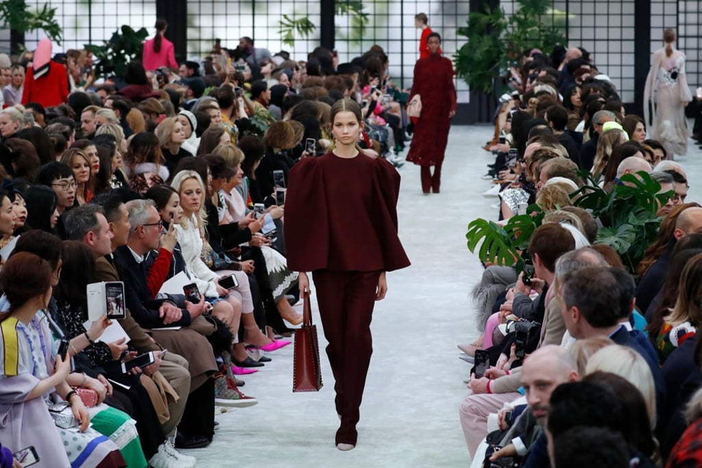A model presents an elegant creation from Valentino during Paris Fashion Week. Photo: AFP