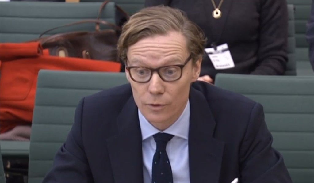 The Chief Executive of Cambridge Analytica, Alexander Nix, gives evidence to the British parliament. Photo: AFP