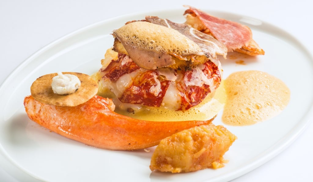 Lightly cooked blue lobster and pork head veil at The Ocean by Olivier Bellin